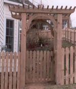Pointed Picket Fence with Gate Arbor
