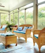 <p>The Bentley&rsquo;s sunroom addition installed on their back yard patio is an inviting retreat for neighbors, family and friends. Their choice of informal wicker porch furniture gives the sunroom a look and feel that is different from the rest of the house.</p>
