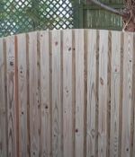 Board-On-Board Privacy Fence With French Gothic Posts
